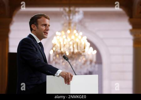 French President Emmanuel Macron delivers a speech during a meeting in memory of the Algerians who fought alongside French colonial forces in Algeria's war, known as Harkis, at the Elysee Palace in Paris, Thursday, Sept. 20, 2021. Macron's speech is the latest step in his efforts to reconcile France with its dark colonial past, especially in Algeria. (Gonzalo Fuentes/Pool Photo via AP)