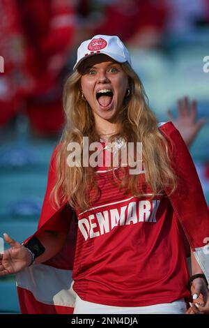 A Denmark team fan cheers as she waits for the start of the Euro 2020 soccer championship quarterfinal match between Czech Republic and Denmark, at the Olympic stadium in Baku, Saturday, July 3, 2021. (Ozan Kose, Pool via AP)