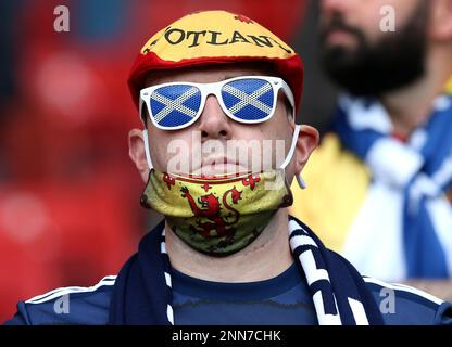 Scottish fan waits for the start of the Euro 2020 soccer championship group D match between Scotland and the Czech Republic at Hampden Park in Glasgow, Scotland, Monday, June 14, 2021. (AP Photo/Robert Perry, Pool)