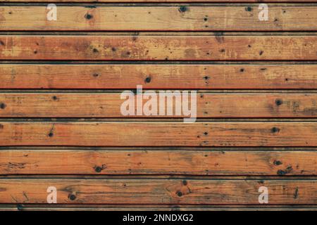 pannelli rustici in legno marrone scuro o legno rivestito di fondo in legno Foto Stock