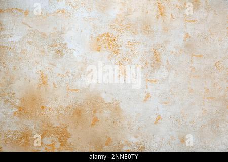 Consente di creare texture ad alta risoluzione. Sfondo marrone per il design e il testo. Grunge con macchie sfondo. Concrey beige chiaro. Primo piano cemento textur Foto Stock