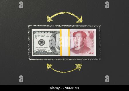 Valuta di borsa internazionale, dollaro a yuan cinese. Conversione di valuta, tassi di cambio, mercato dei cambi. Foto Stock
