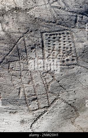 rocce con incisioni rupestri, mappa di bedolina, capo di ponte, italia Foto Stock