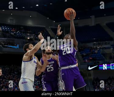 Saturday Dec 16th - Northwestern Wildcats guard Scottie Lindsey (20) puts up a shot during NCAA Mens basketball game action between the Northwestern Wildcats and the DePaul Blue Demons at the Windtrust Arena in Chicago, IL. (Cal Sport Media via AP Images)
