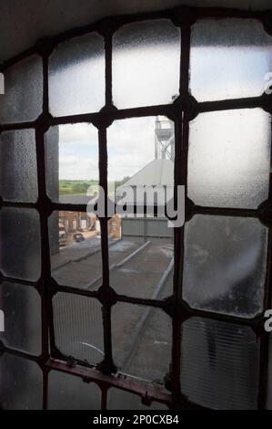 Particolare della Vittoriana Tower Brewery che ospita la Hook Norton Beer Brewery, Oxfordshire. Foto Stock