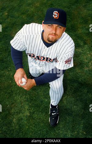 San Diego Padres Trevor Hoffman yawns while his son, Quinn Hoffman