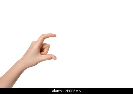 Mano femmina come se si trattasse di qualcosa o mostrasse le dimensioni, isolare le mani vuote. Foto Stock