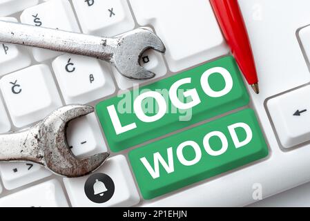 Ispirazione che mostra segno legno logo. Parola scritta su disegno riconoscibile o simbolo di un'azienda inscritta su legno Foto Stock
