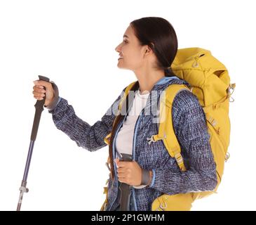 Escursionista femminile con zaino e bastoncini da trekking su sfondo bianco Foto Stock