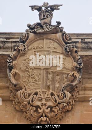 Stemma su un edificio a Medina Malta Foto Stock