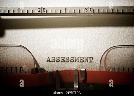 Parola di valutazione scritta con una macchina da scrivere. Foto Stock
