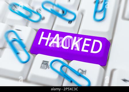 Didascalia concettuale Hacked. Word for accesso non autorizzato ai dati nel sistema o nel computer Cyber Crime Foto Stock