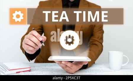 Didascalia concettuale tempo del tè. Idea di affari il tempo nel pomeriggio in cui alcune persone mangiano un piccolo pasto Foto Stock