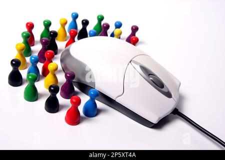 mouse per computer con gettoni colorati, riunione di squadra Foto Stock