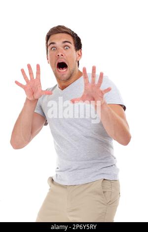OMG il suo gemito verso di me. un uomo scioccato alzando le mani di sorpresa mentre si trovava in studio. Foto Stock