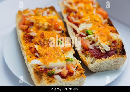 Pane francese Pizza Foto Stock