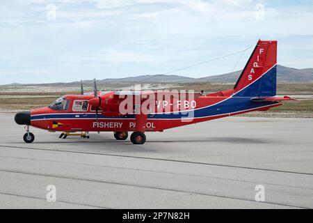 Un aereo di Islander VP-FBO, del Servizio aereo governativo delle Isole Falkland, FIGAS, all'aeroporto di Stanley, Isole Falkland. Utilizzato per la pattuglia della pesca. Foto Stock