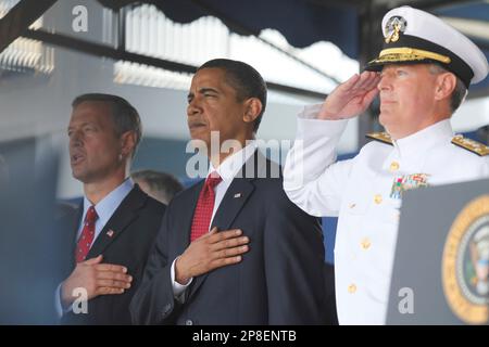 President Barack Obama stands with Naval Academy Superintendent Vice Adm. Jeffrey L. Fowler, right, and Maryland Gov. Martin O'Malley, at the United States Naval Academy graduation ceremony in Annapolis, Md., Friday, May 22, 2009. (AP Photo/Charles Dharapak)