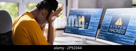 Sistema informatico hacked. Schermata del software antivirus sul monitor Foto Stock