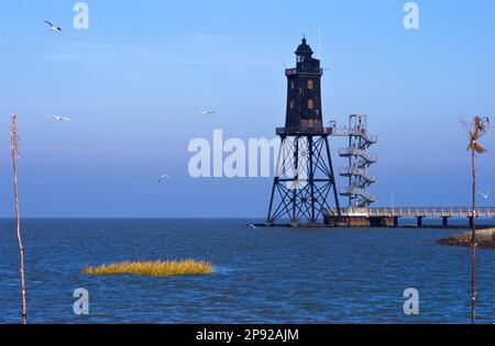 Il faro Oberiversand a Dorum Neufeld nel quartiere di Cuxhaven, Germania Foto Stock