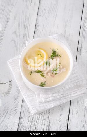 Zuppa di pollo all'Avgolemono con riso e limone Foto Stock