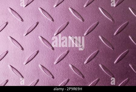 Vista dall'alto della superficie del pavimento in metallo color mauve Foto Stock