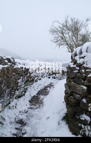 Oakworth to Haworth Path, West Yorkshire, UK. UK Weather. Snow scene along The Worth Valley. Foto Stock