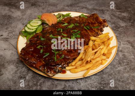 Costole di ricambio per barbecue Foto Stock