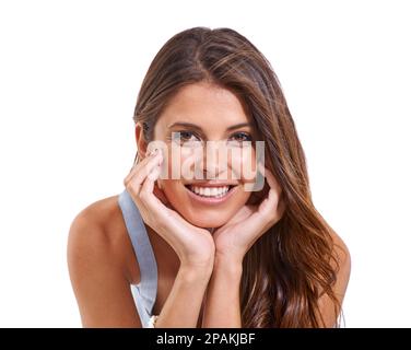 Shes giovane e fiducioso. Studio ritratto di una giovane donna attraente isolato su bianco. Foto Stock
