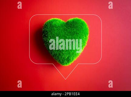 Palla verde cuore in bolla di parola su sfondo rosso. Verde erba forma del cuore, donazione online. Ambiente e protezione sostenibile delle piante, Eco-frien Foto Stock