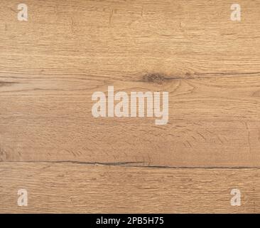 Sfondo da un pannello laminato imitazione di legno di quercia vecchio con nodi e crepe. Foto Stock