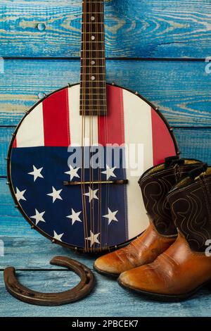 Boots Banjo e Cowboy piccoli Foto Stock