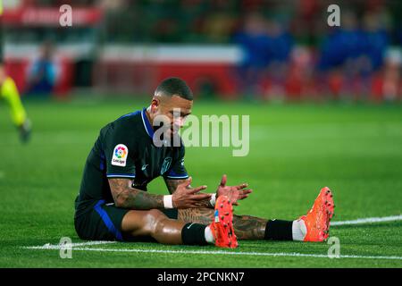 Madrid, Spagna. 13th Mar, 2023. Memphis Depay dell'Atletico de Madrid reagisce durante un incontro la Liga Santander tra il Girona FC e l'Atletico de Madrid nello stadio Montilivi di Girona, Spagna, il 13 marzo 2023. Credit: Joan Gosa/Xinhua/Alamy Live News Foto Stock