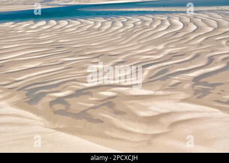 Modelli di sabbia marina, Bazaruto, Mozambico, Africa Foto Stock