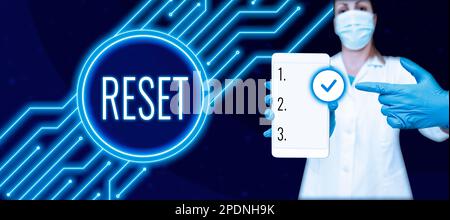 Scrittura visualizzazione testo Reset. Concetto che significa far tornare il dispositivo alla modalità di fabbrica, impostare nuovamente il punto di inizio zero Foto Stock