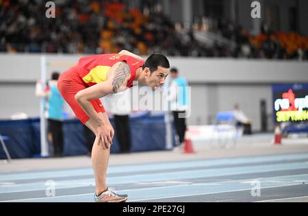 Tianjin. 15th Mar, 2023. Gao Xinglong reagisce durante la finale maschile di Long Jump dei Campionati nazionali cinesi indoor di atletica leggera del 2023 al Tuanbo Sports Center di Tianjin, nel nord della Cina, il 15 marzo 2023. Credit: Zhao Zishuo/Xinhua/Alamy Live News Foto Stock