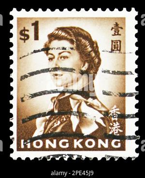 MOSCA, RUSSIA - 15 FEBBRAIO 2023: Francobollo stampato a Hong Kong mostra la Regina Elisabetta II, serie, circa 1962 Foto Stock
