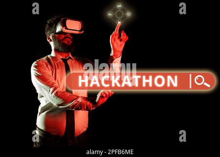 Scrittura a mano del testo Hackathon. Evento di presentazione aziendale in cui un gran numero di persone si impegna nella programmazione Foto Stock