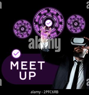 Cartello con la scritta Meet Up. Parola scritta sulla riunione informale che riunisce il lavoro di squadra collaborazione di gruppo di discussione Foto Stock