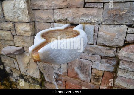 Grecia, Grecia settentrionale, Grevena Dotsiko tradizionale villaggio ponte di pietra ad arco Foto Stock