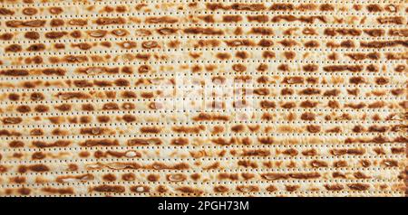 Pesach Celebration Concept - vacanza ebraica Pesach. Texture sfondo da matzah per banner e screensaver. Foto Stock