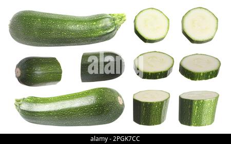 Set di zucchine fresche mature su sfondo bianco Foto Stock