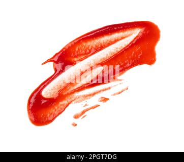 Primo piano macchia bagnata di salsa di pomodoro ketchup rosso isolato su sfondo bianco, vista dall'alto, direttamente sopra Foto Stock
