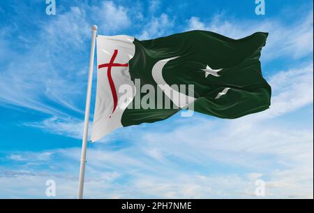 Bandiera del Pakistan con croce che ondola nel vento a cielo nuvoloso. amate la fede dello spirito santo, la speranza della gente nella pasqua, il concetto di religione. Spazio di copia. illustrazione 3d Foto Stock