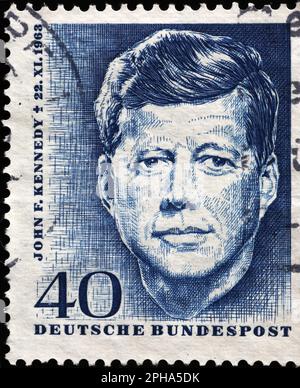 Ritratto di John F. Kennedy su francobollo tedesco Foto Stock
