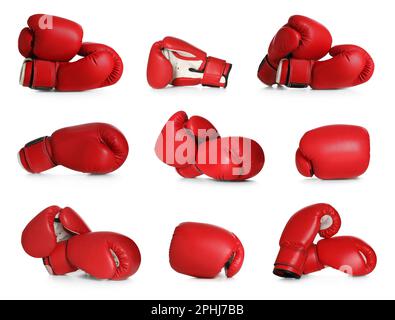 Set con guanti da boxe rossi su sfondo bianco Foto Stock