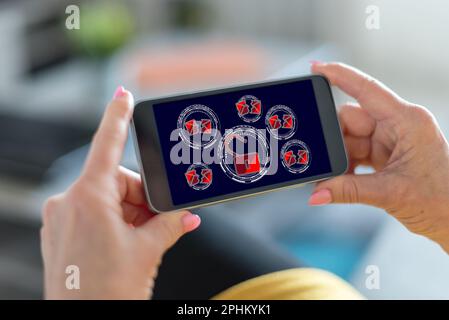 Lo schermo dello smartphone visualizza un concetto di spam Foto Stock