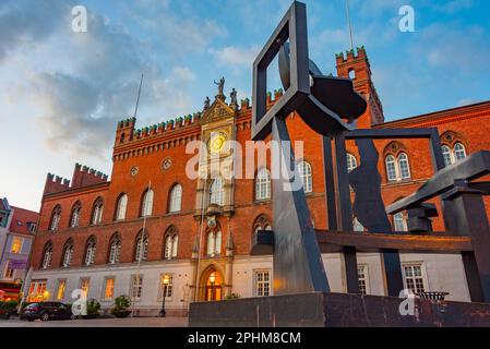 Vista al tramonto del municipio in danese Odense città. Foto Stock