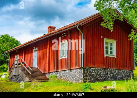 Edifici residenziali di vecchia fabbrica a Fiskars, Finlandia. Foto Stock