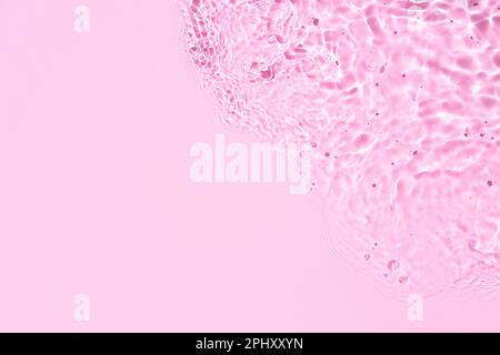 Banner di rosa Abstract acqua di fondo texture con ondate e onde. Spazio di copia Foto Stock